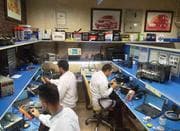 مرکز تخصصی ، ریمپ و تعمیر کامپیوتر خودرو (ECU)